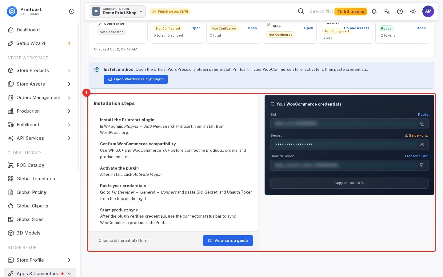 Your WooCommerce credentials box showing Sid, Secret and Unauth Token with the values hidden