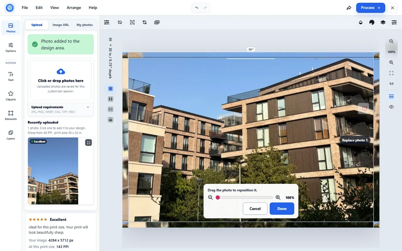 Canvas designer: dragging the photo to reposition it, with the zoom slider